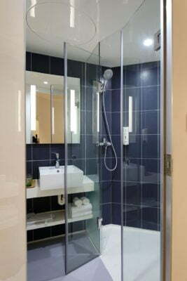 a bathroom with a glass shower