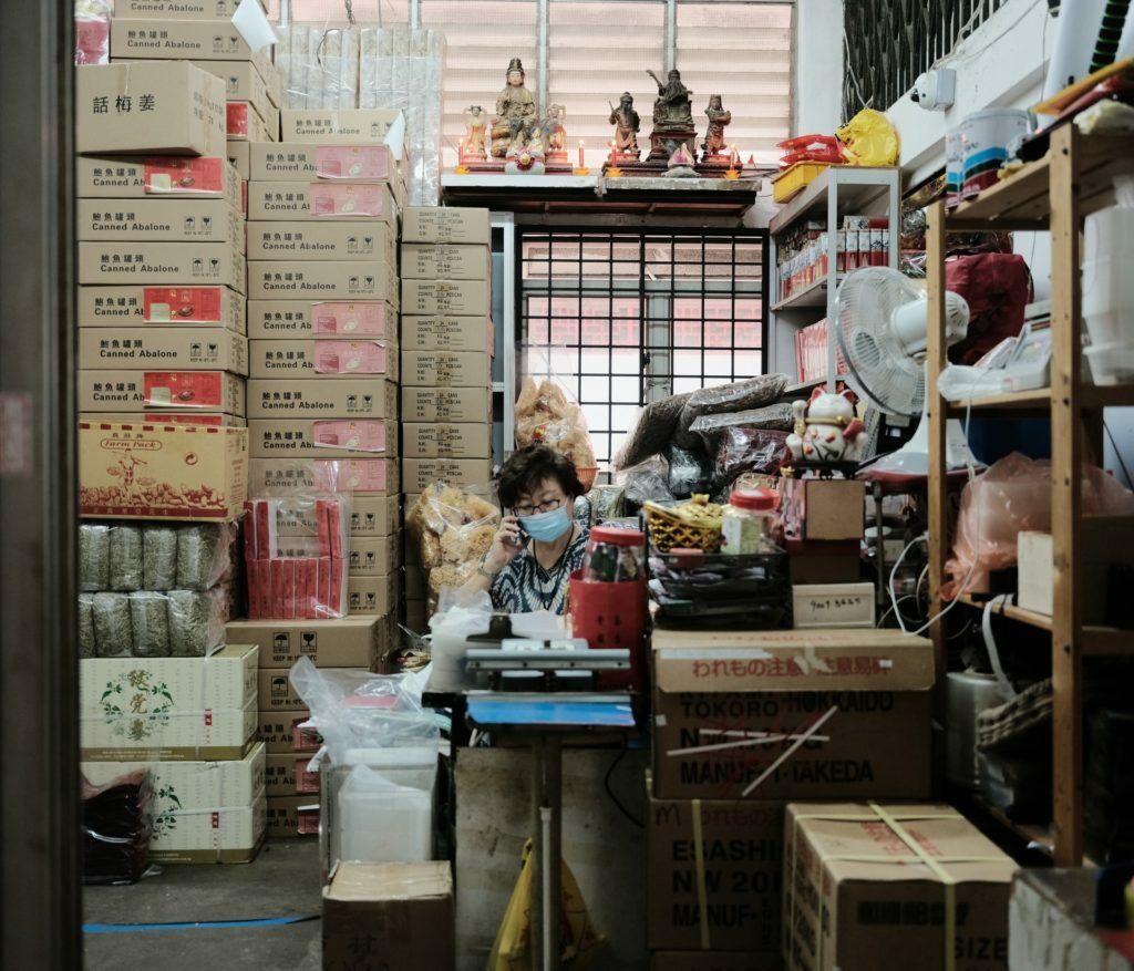 a person and a child in a warehouse